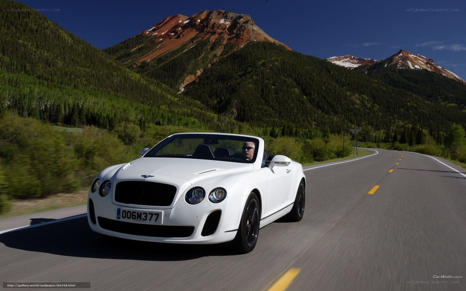 White Bentley on mountain road