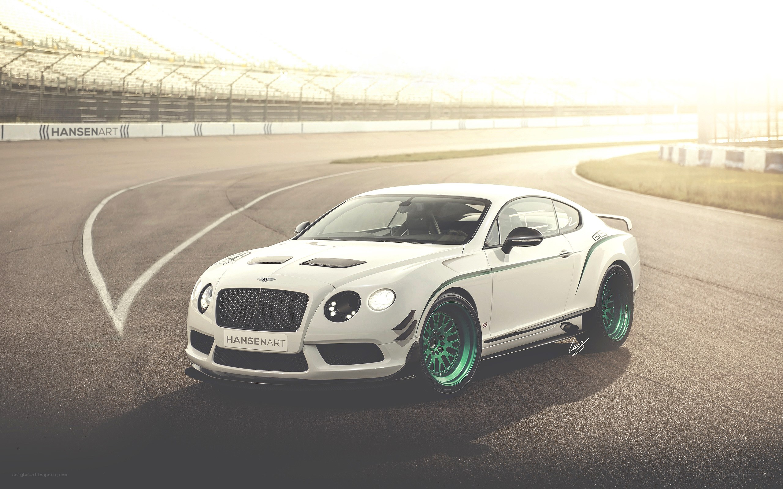 White Bentley on racetrack