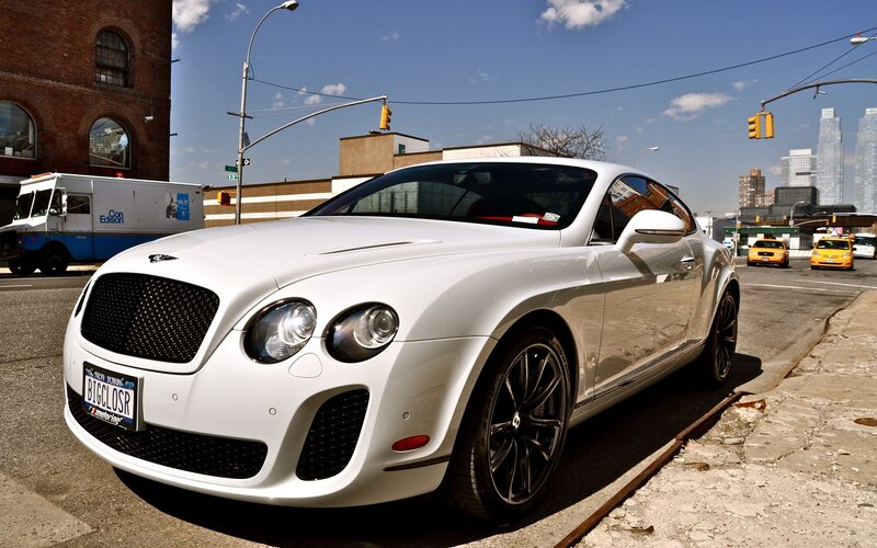 White Bentley parked on city street