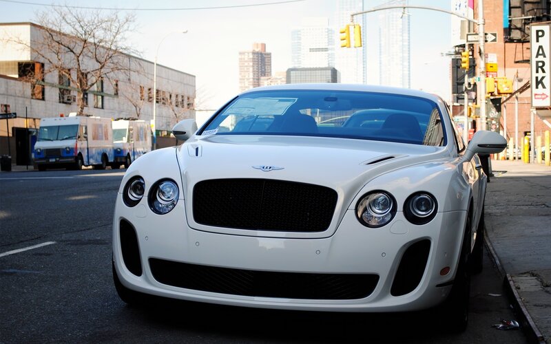 White Bentley parked on city street