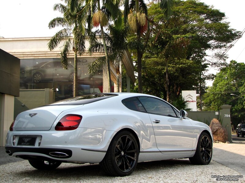 White Bentley parked outside