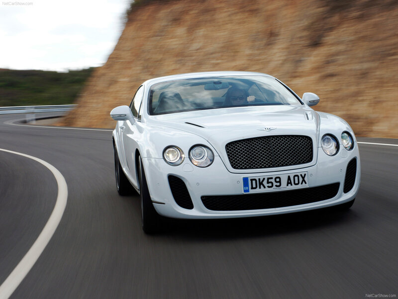 White Bentley speeding on a road