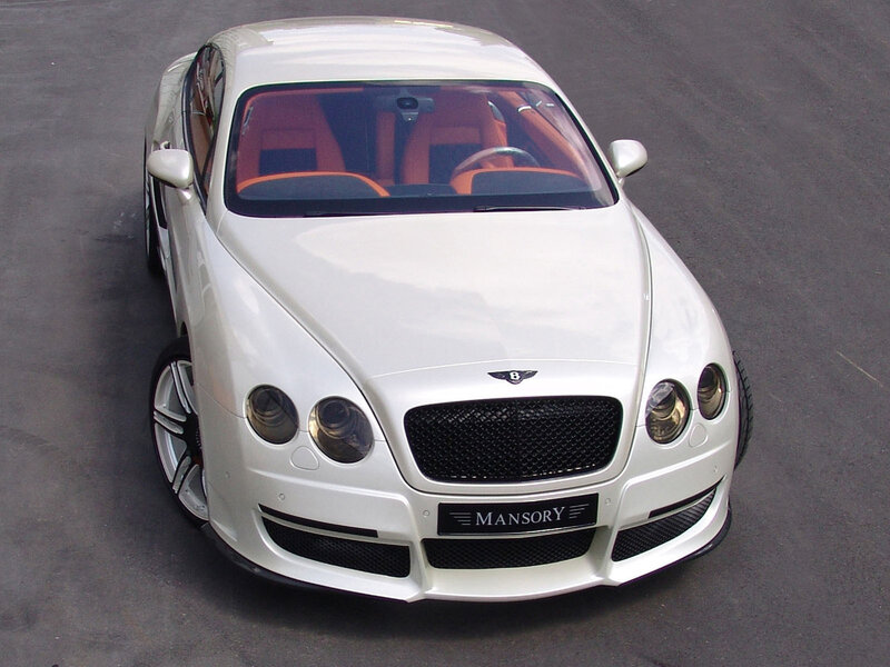 white bentley with orange interior