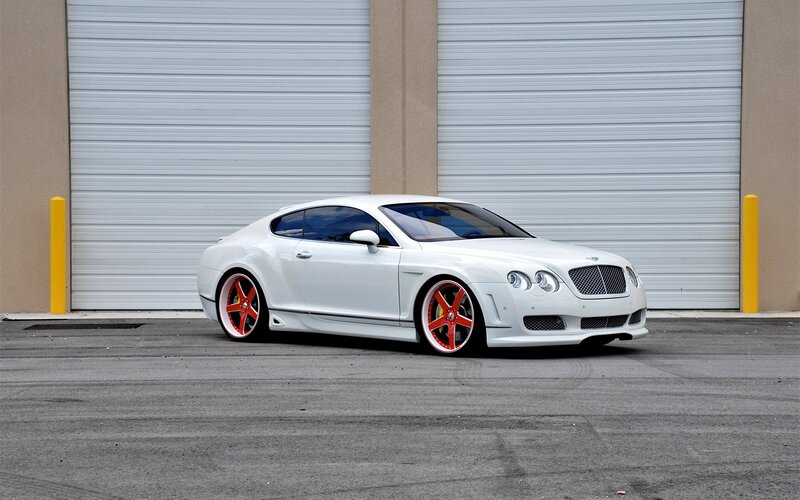white bentley with red wheels