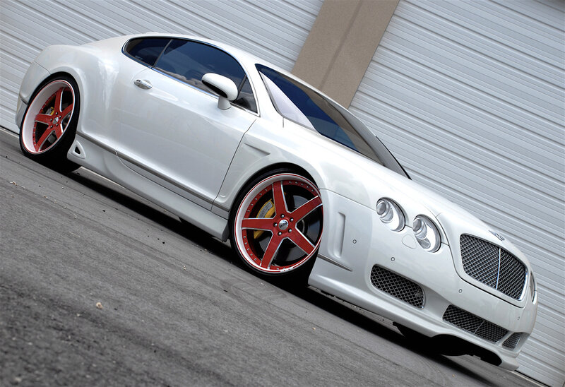 white bentley with red wheels