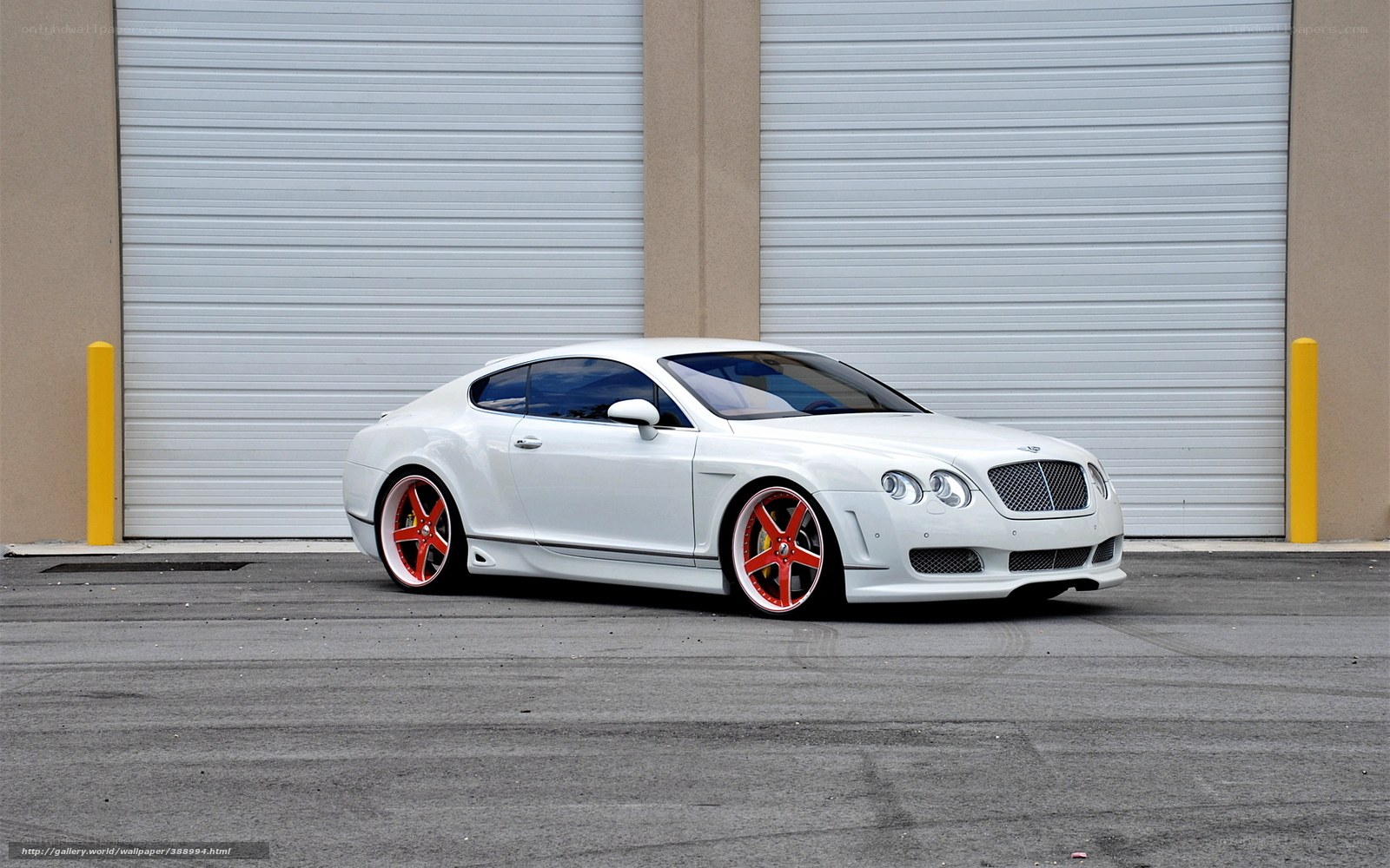 white bentley with red wheels