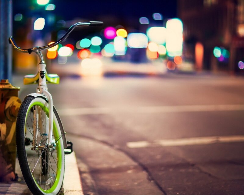 White Bicycle on Sidewalk