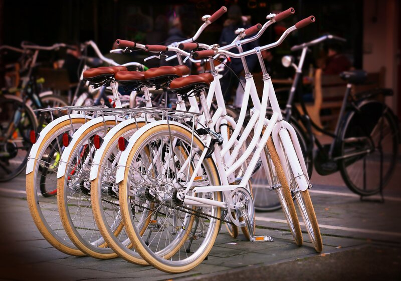 White bicycles in a row