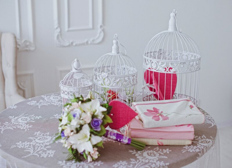 White Birdcages on Table — Serene