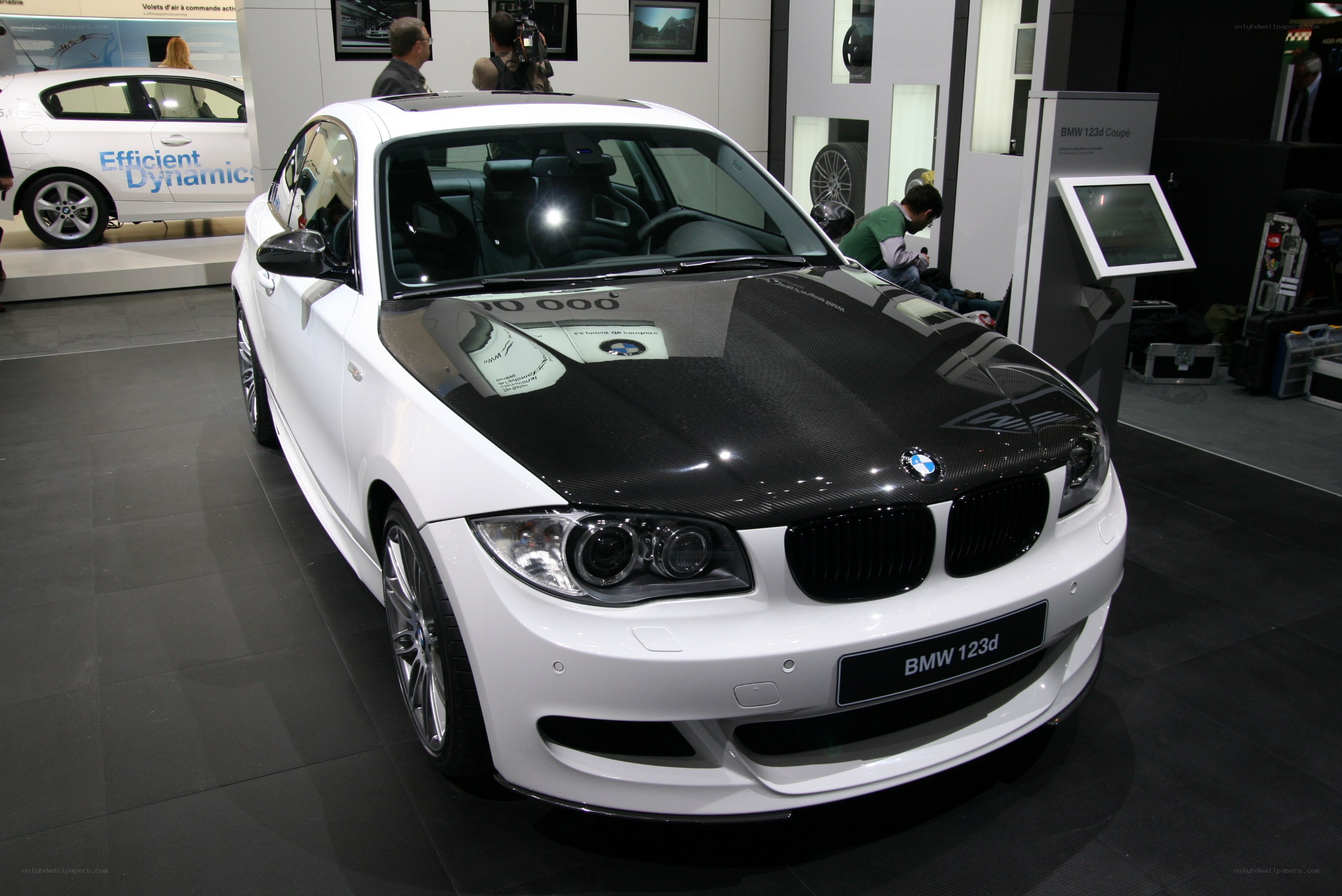 White BMW 123d Coupe on display