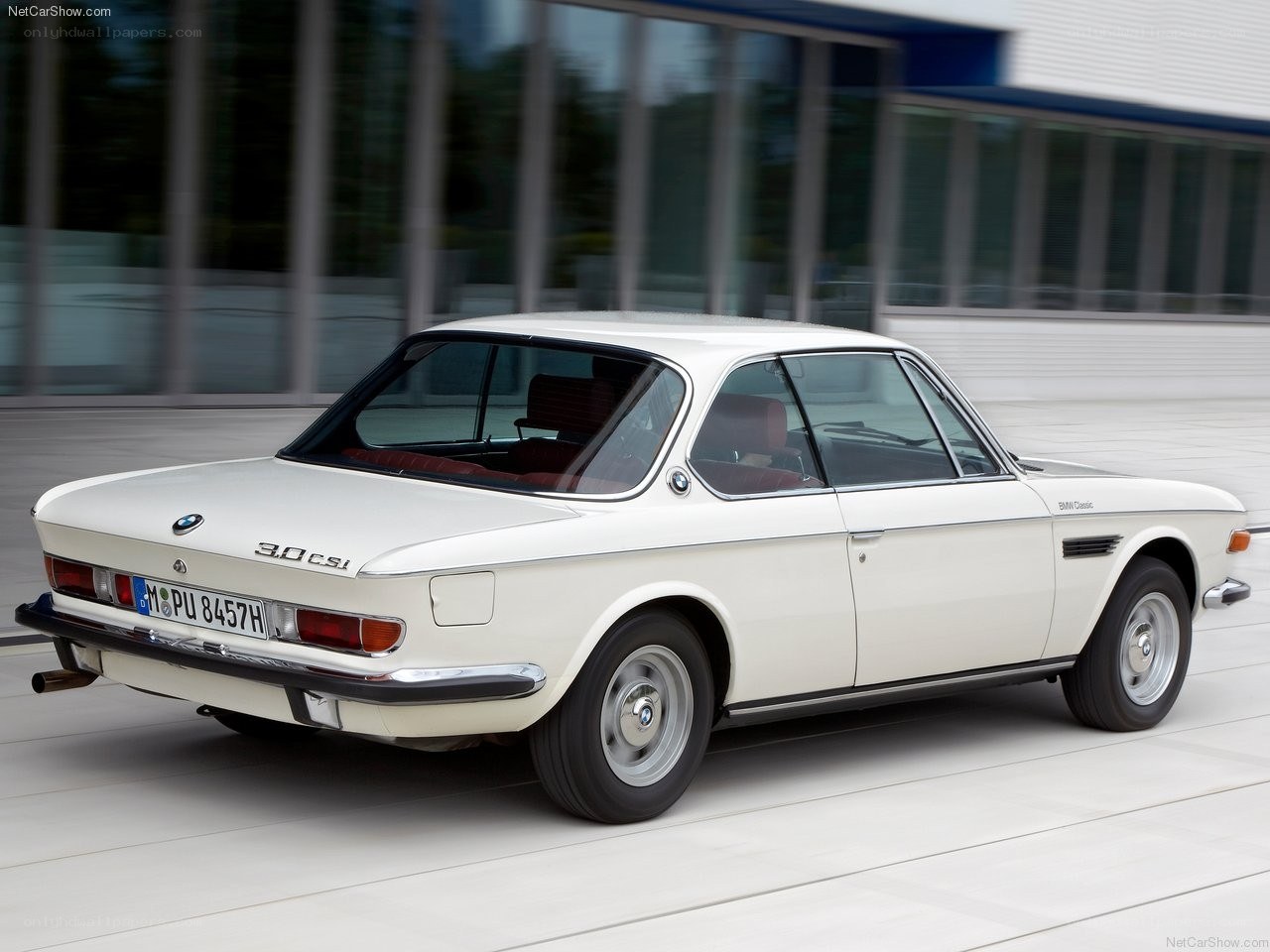 White BMW 3.0 CSi in motion