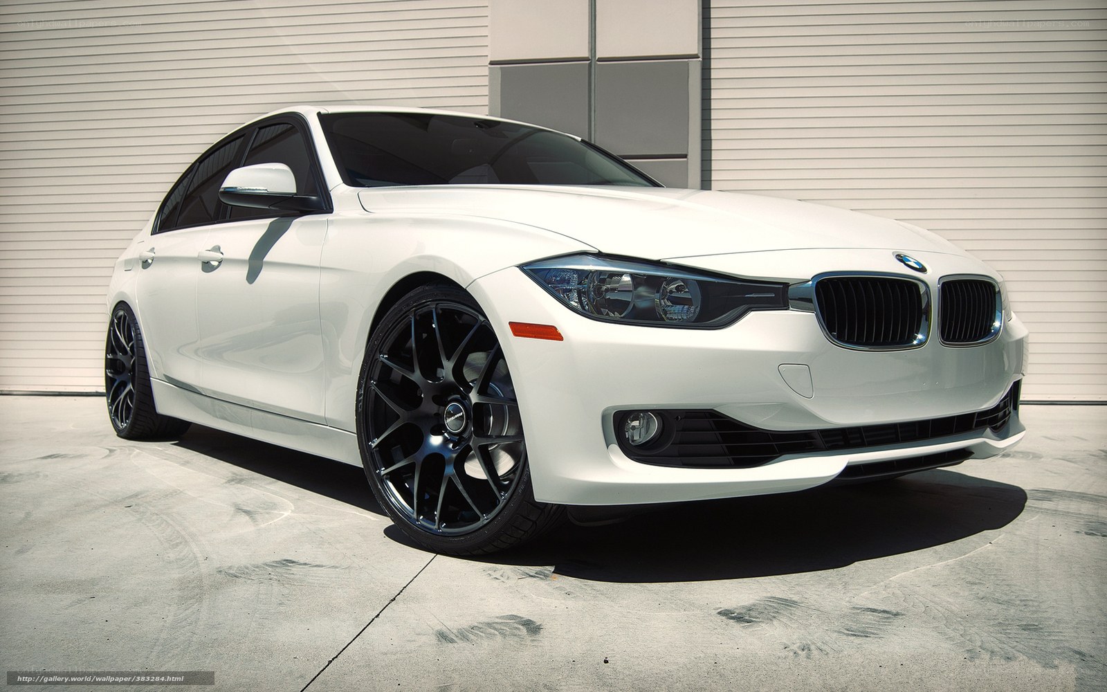 White BMW 3 Series sedan