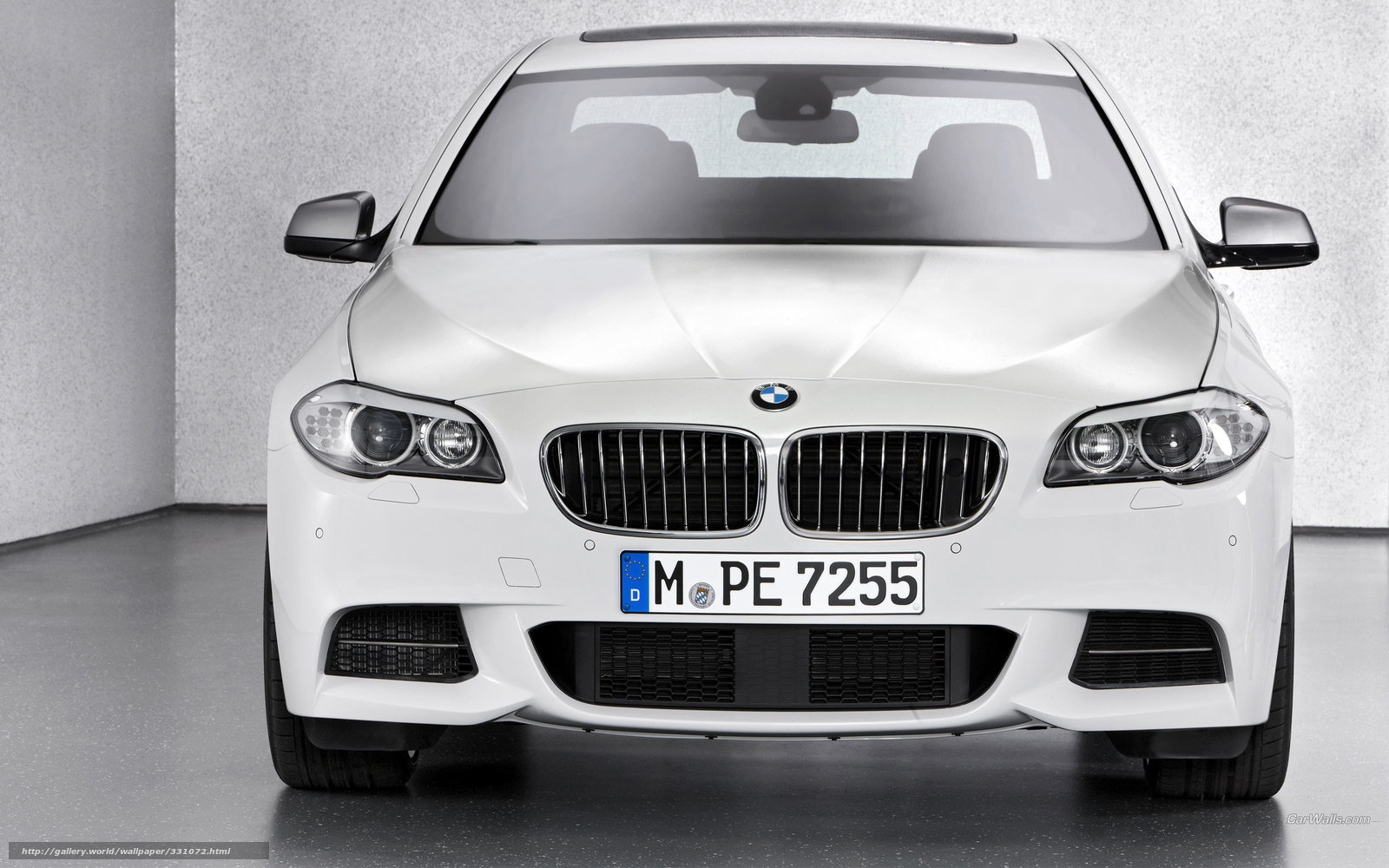 White BMW 5 Series sedan