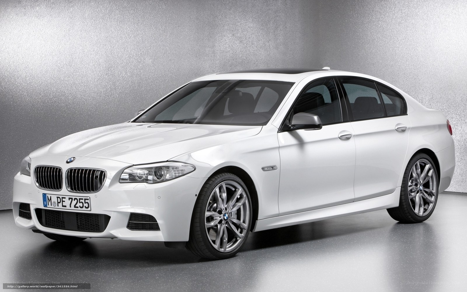 White BMW 5 Series sedan