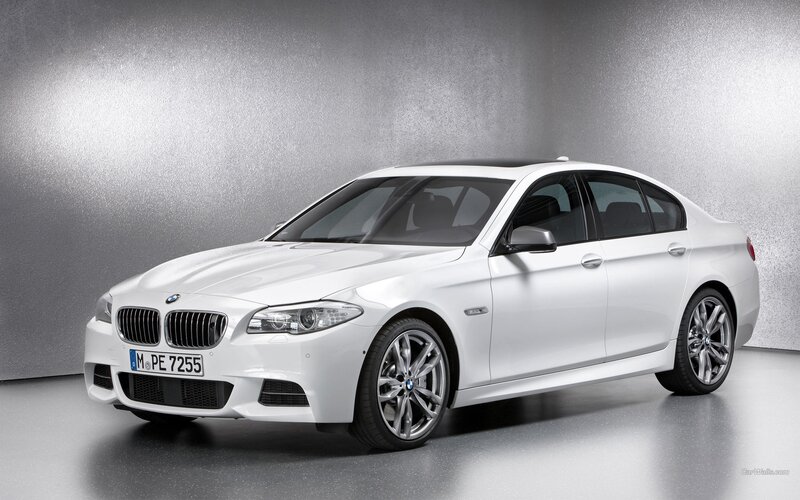 white bmw 5 series sedan