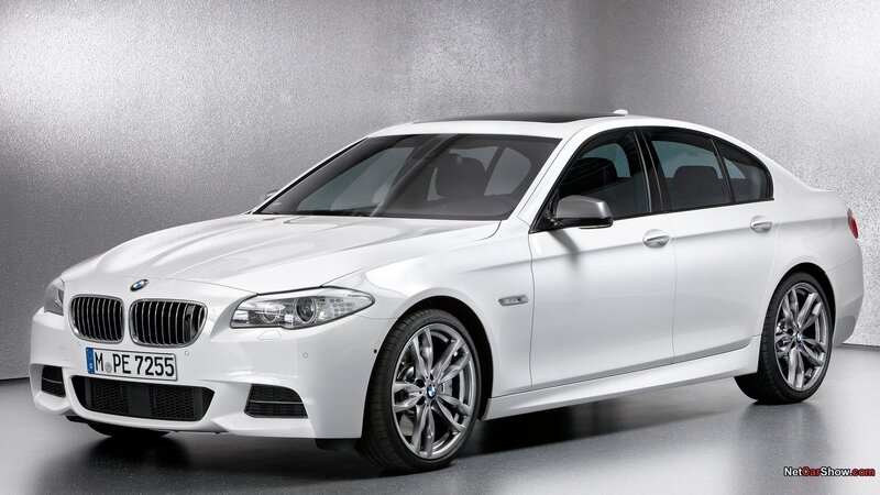 white bmw 5 series sedan