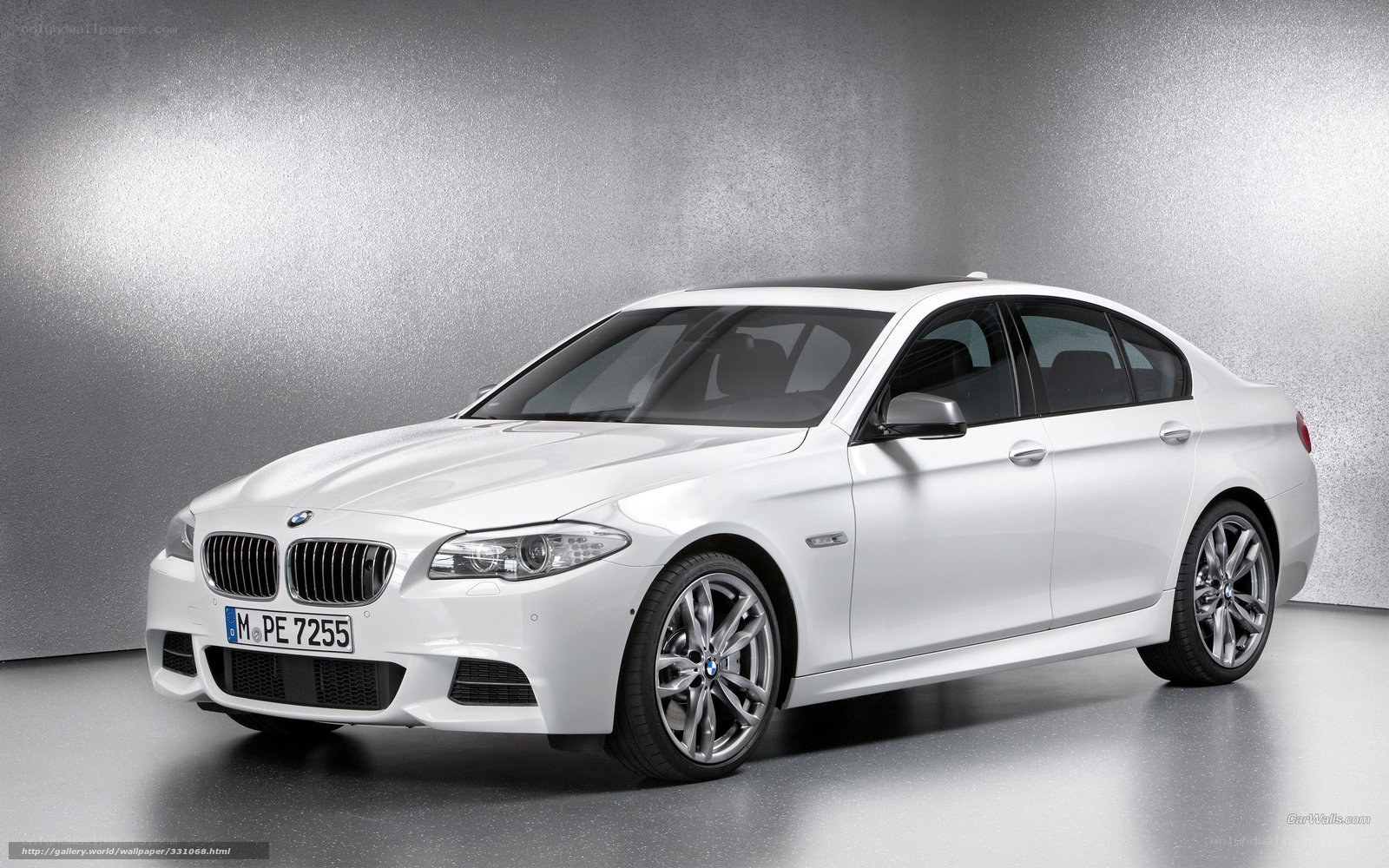 white bmw 5 series sedan