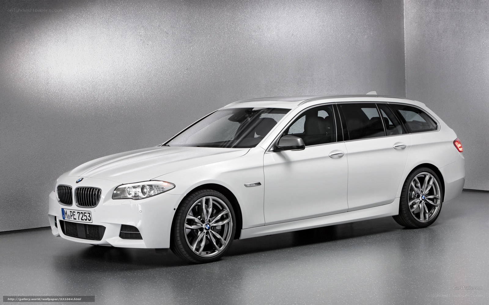 white bmw 5-series wagon
