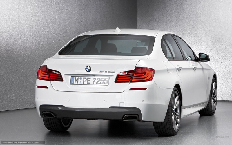 white bmw 530d sedan