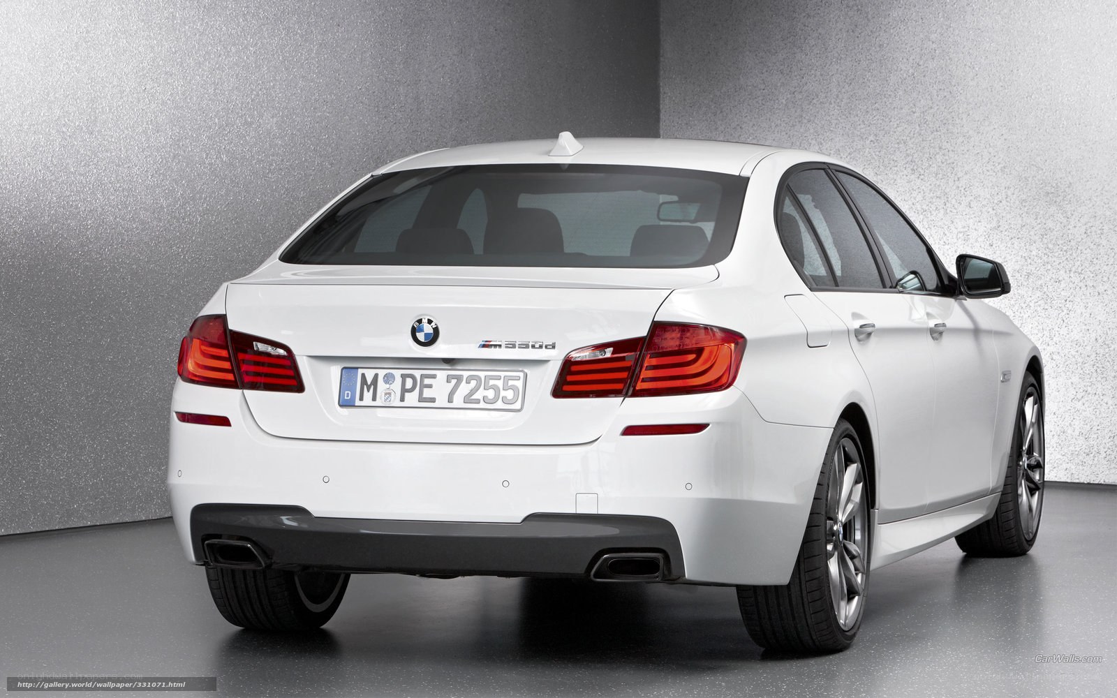 white bmw 530d sedan
