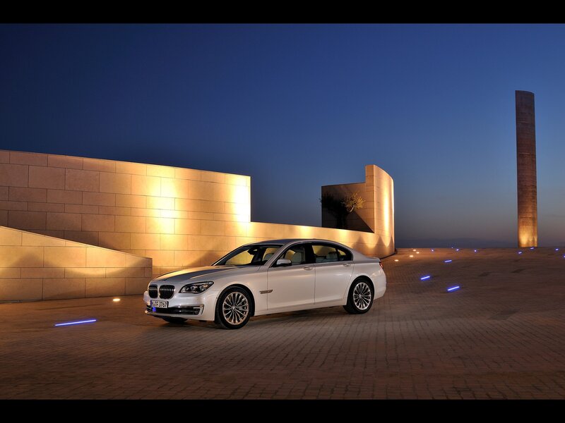 White BMW 7-series — Dramatic, Night, Photograph, Building, Pavement