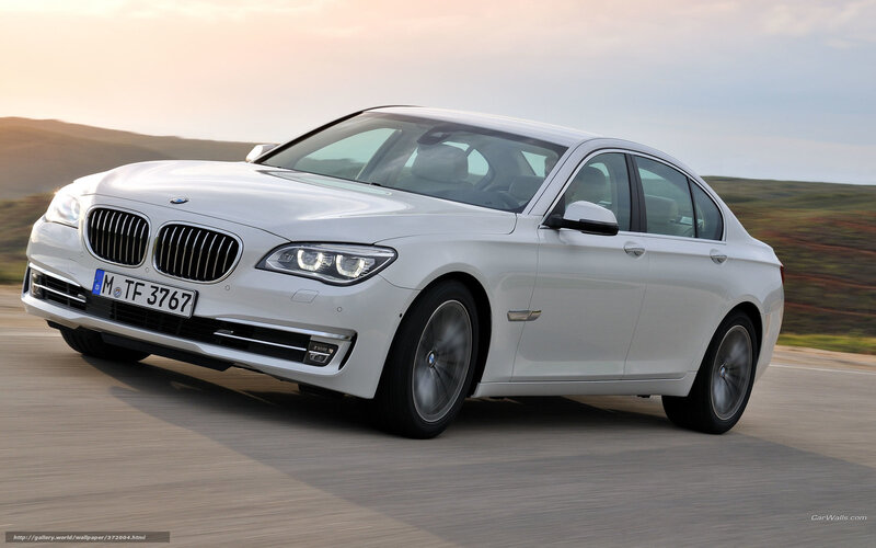 white bmw 7-series in motion
