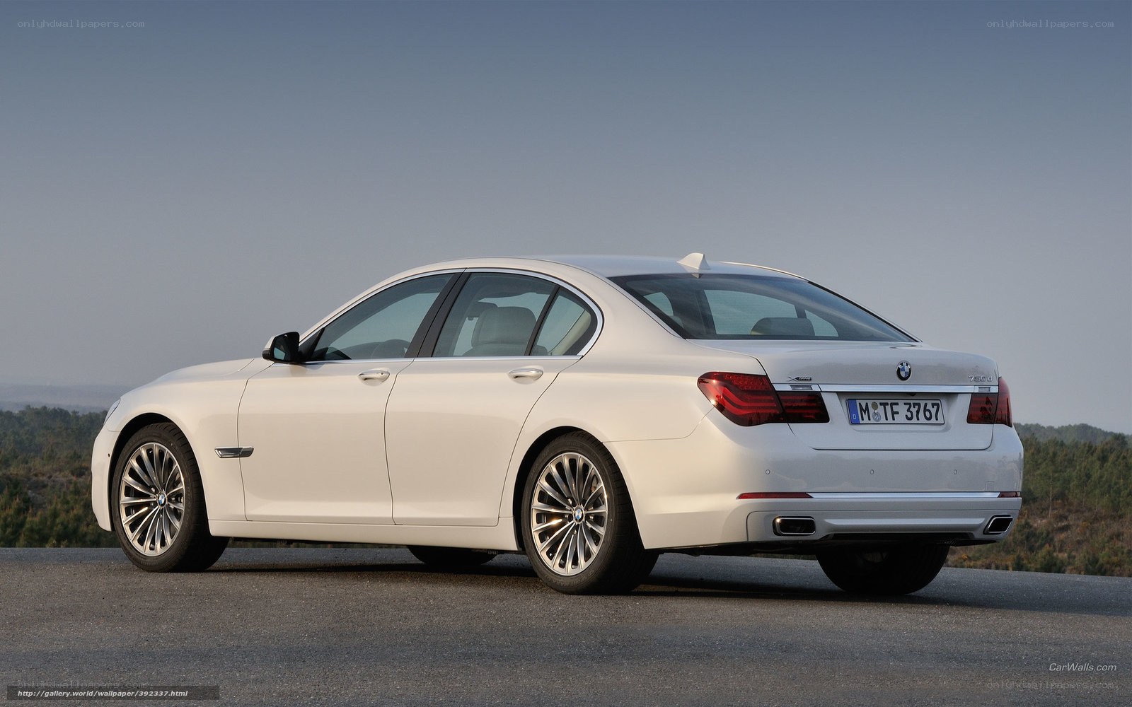 white bmw 7-series sedan