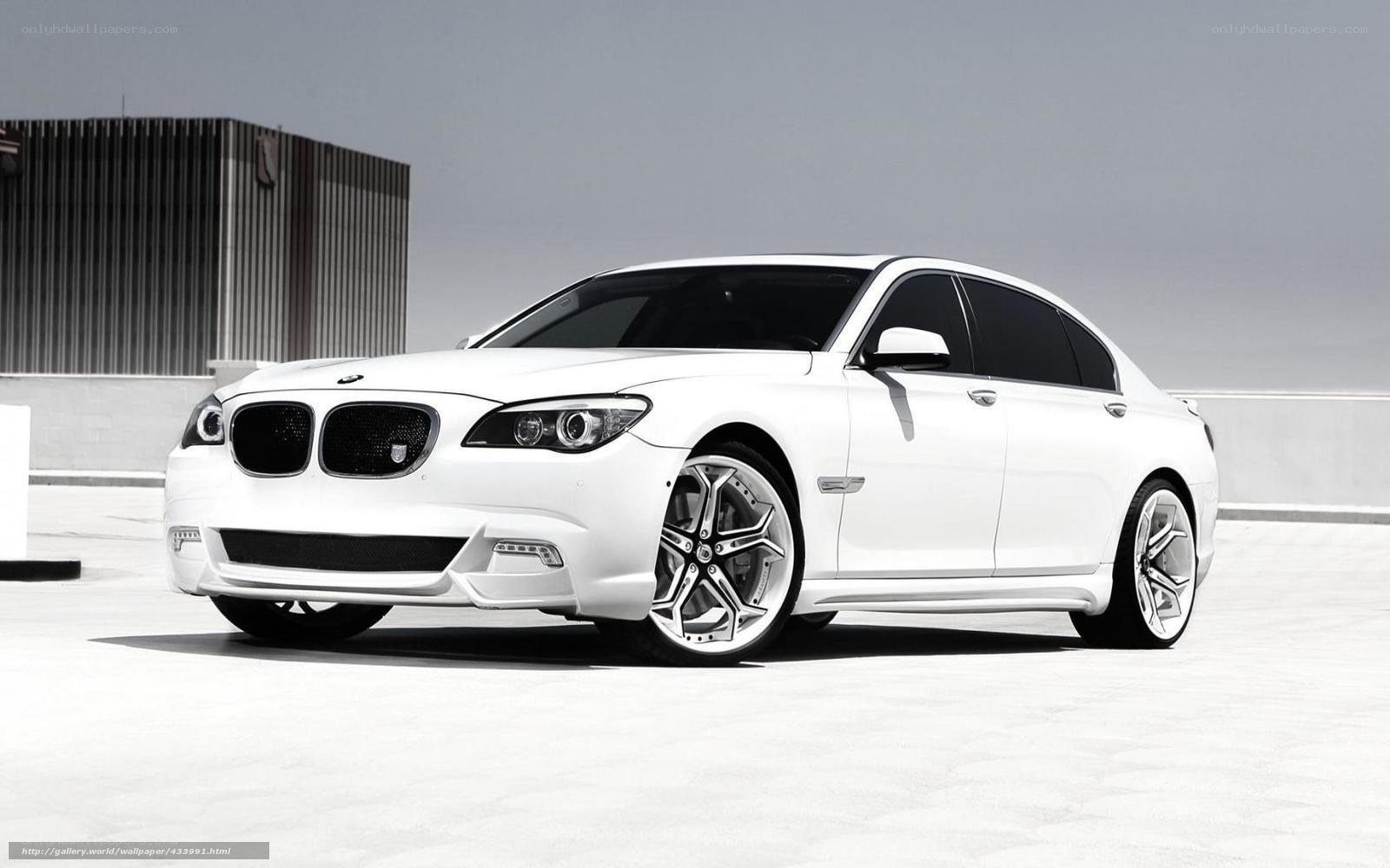 White BMW 7 Series sedan