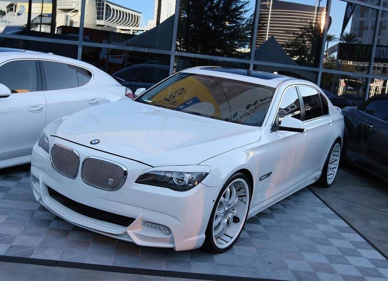 White BMW 7 Series sedan