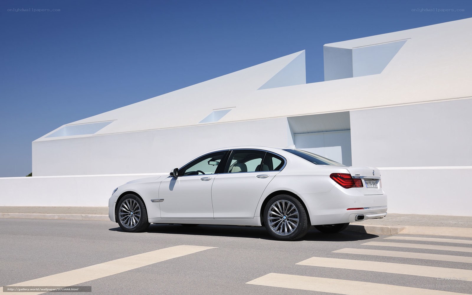 White BMW 7-Series sedan