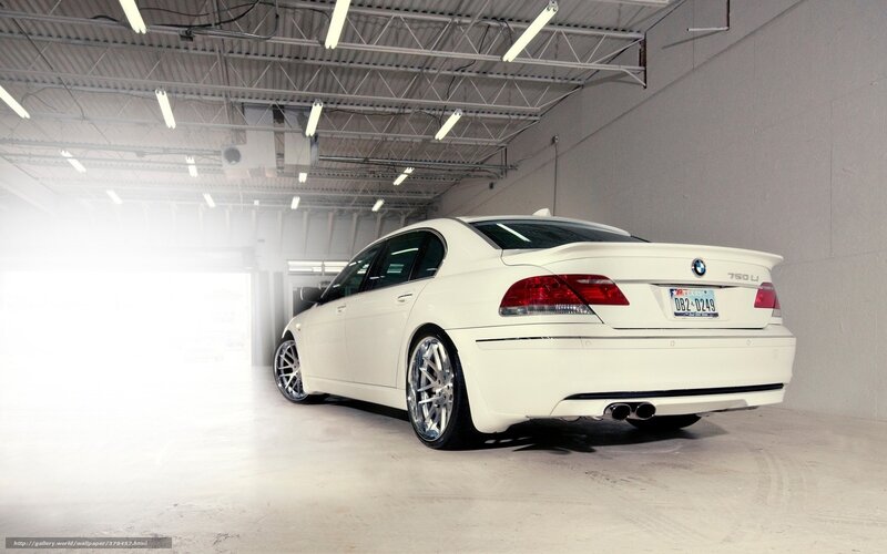 white bmw 750li in garage