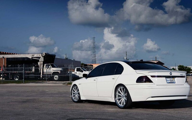 White BMW 760Li parked in lot