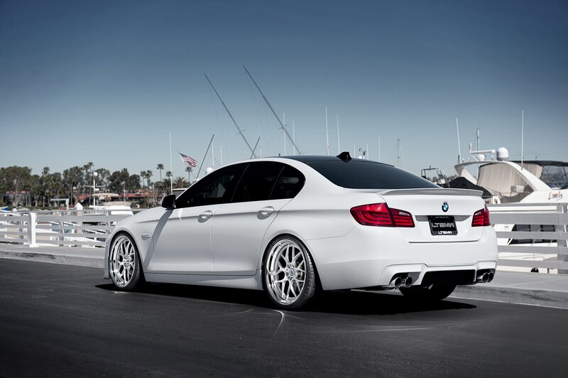 white bmw at marina