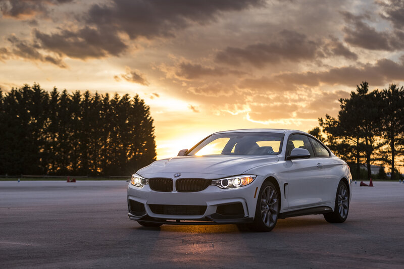 White BMW at sunset