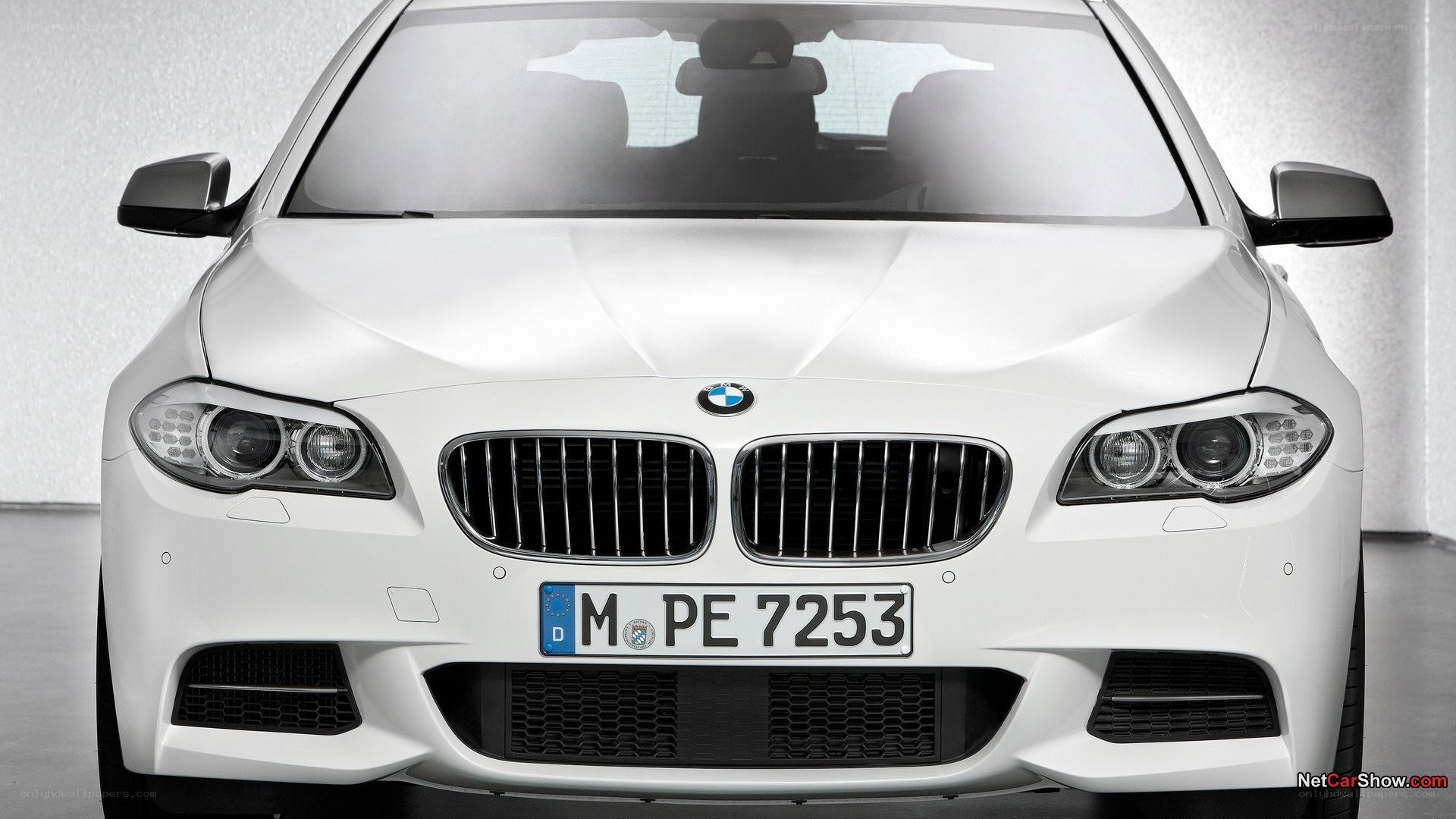white bmw car front view