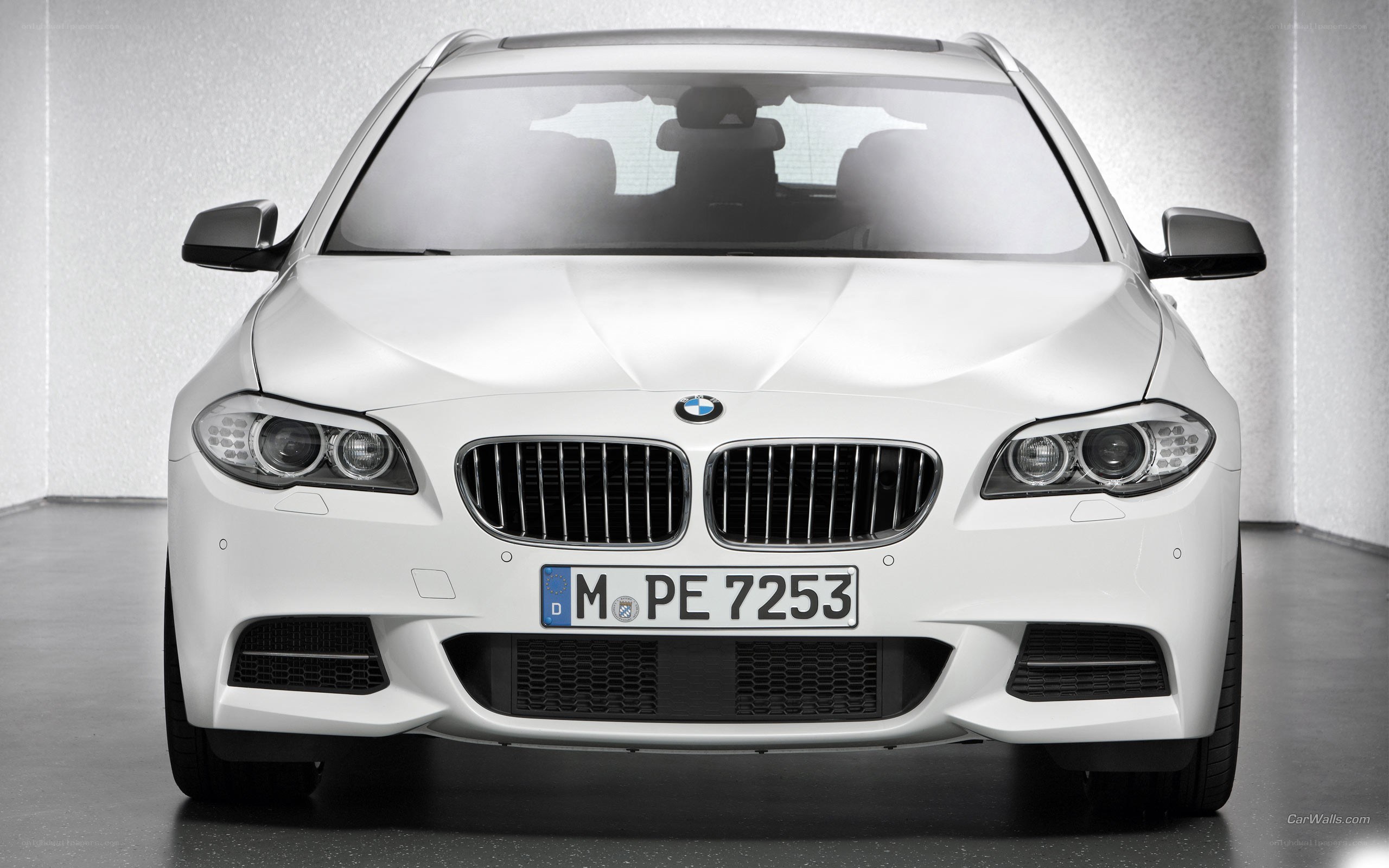 white bmw car front view