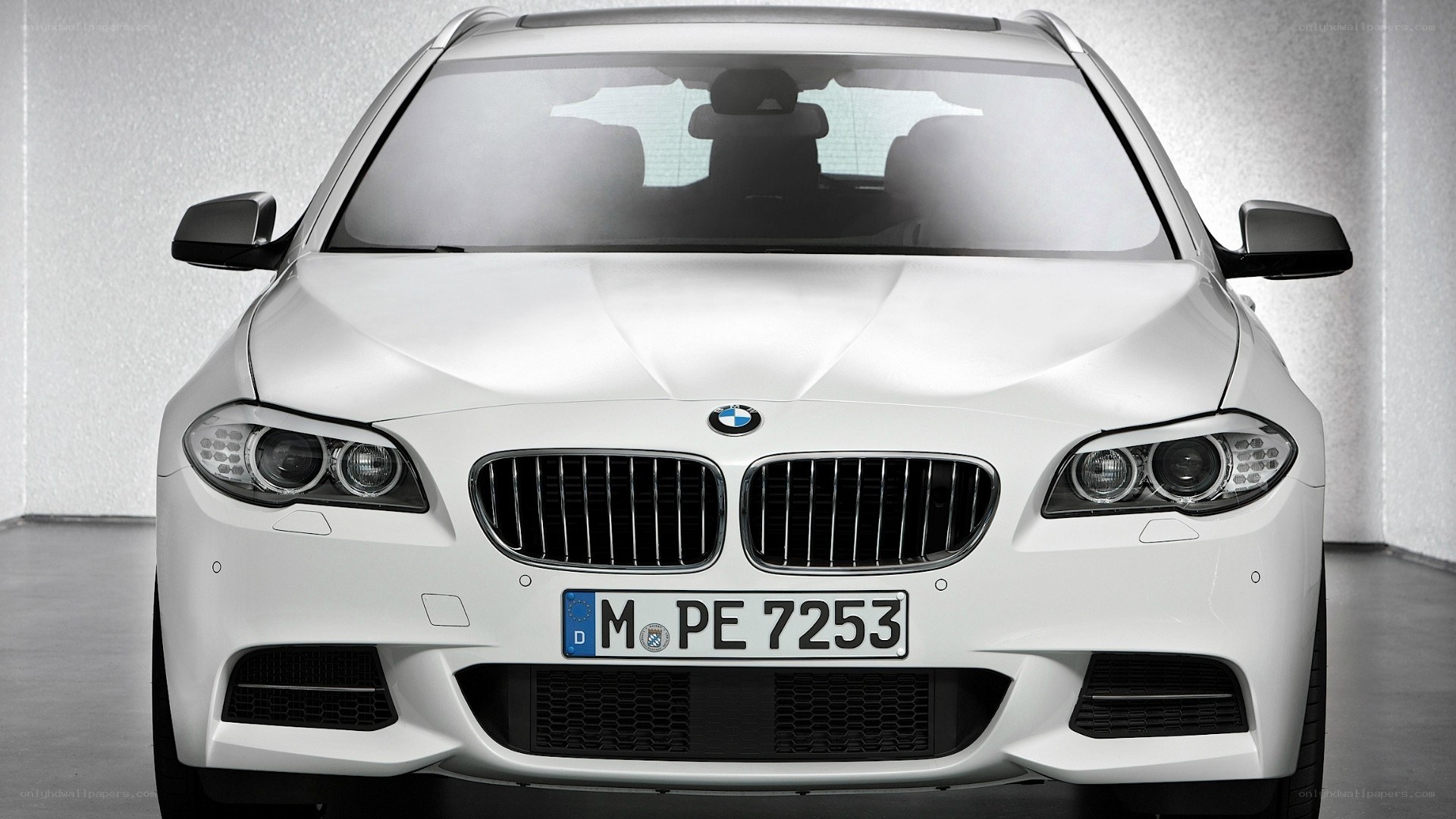 white bmw car front view