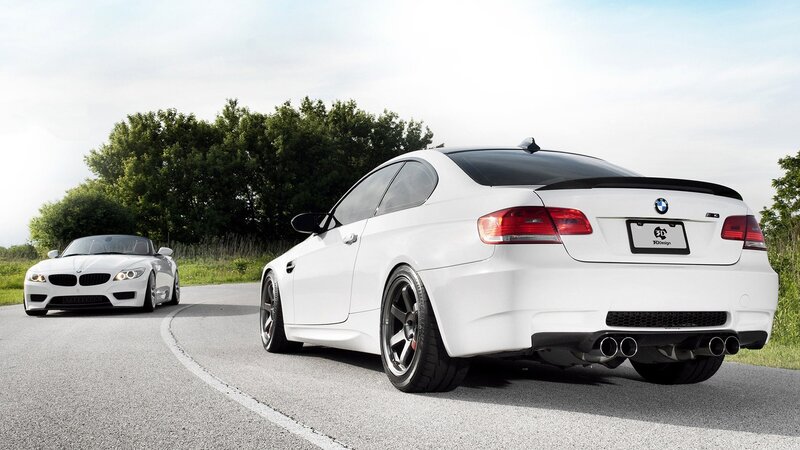 White BMW Cars on Road — Dynamic