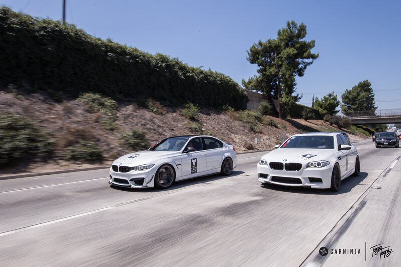 White BMW Cars on Road