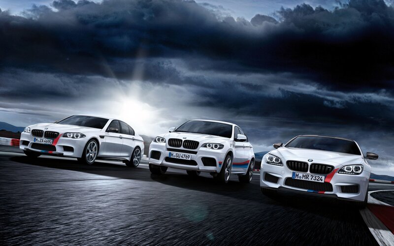 White BMW Cars on Track — Dramatic