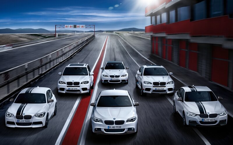 White BMW Cars on Track
