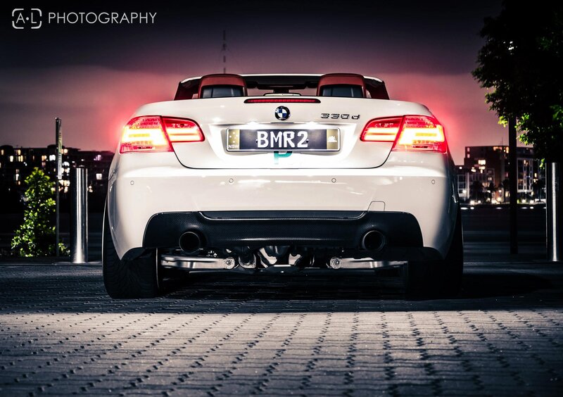 White BMW convertible at night