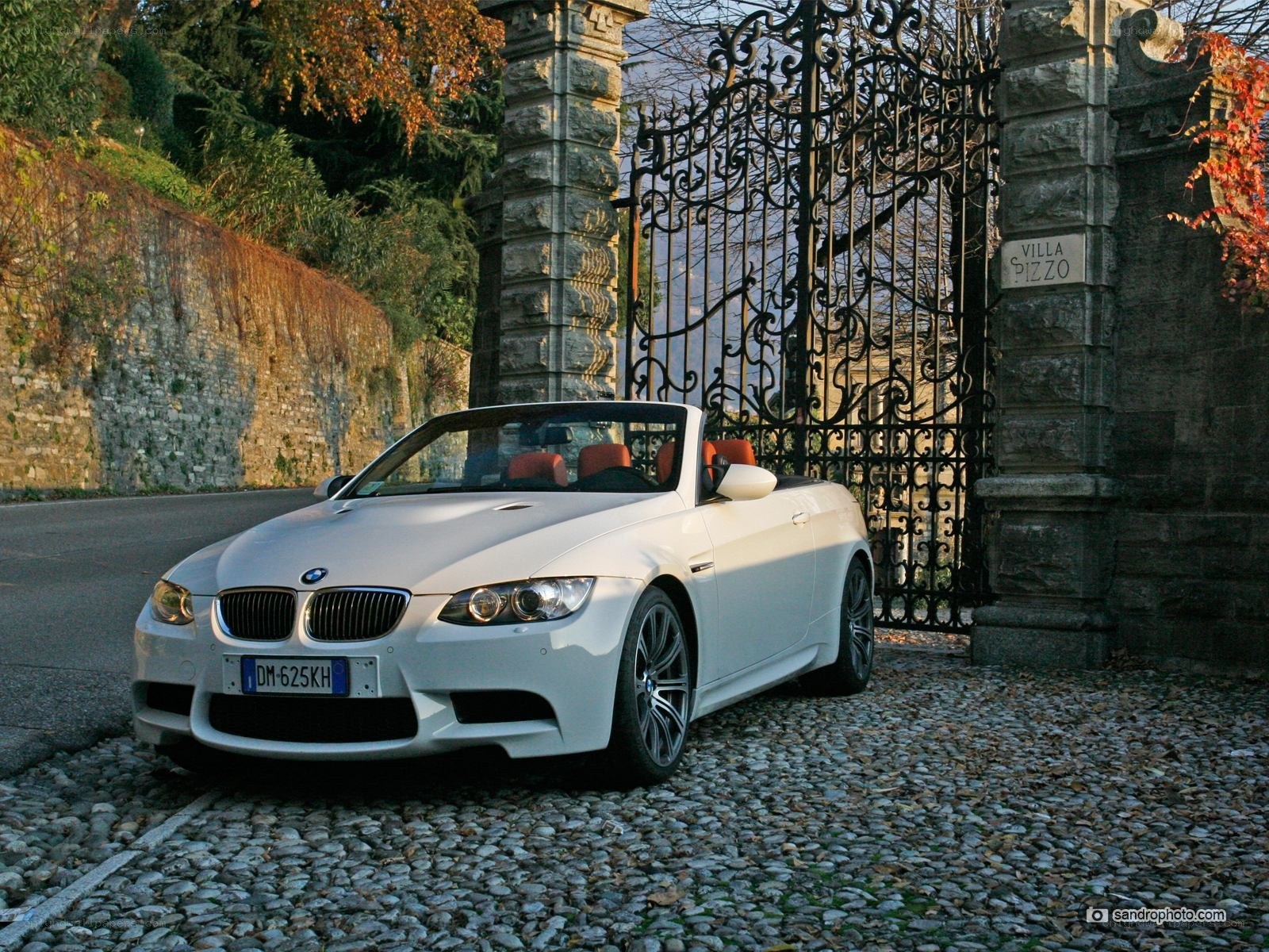 White BMW convertible at villa gate