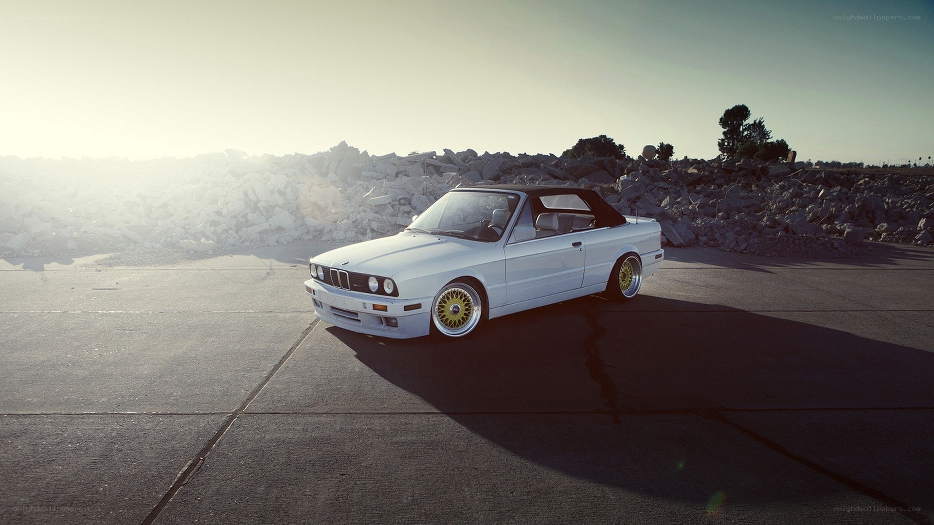 white bmw convertible on pavement