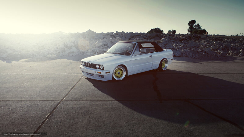 white bmw convertible on pavement