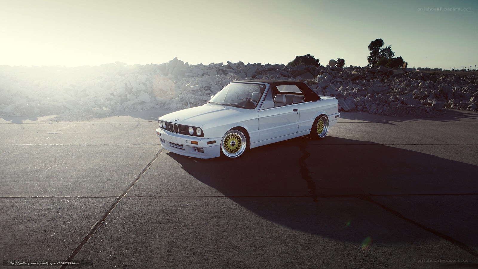 white bmw convertible on pavement