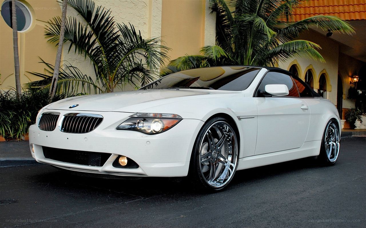 White BMW convertible parked