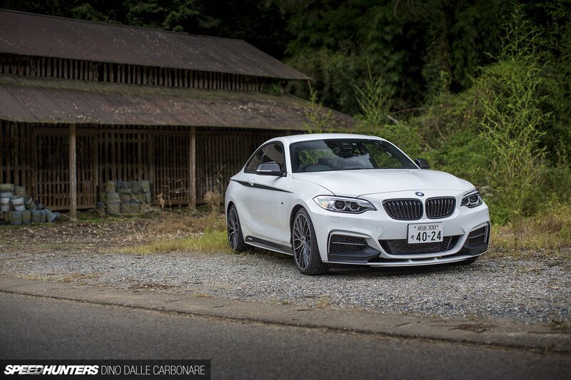 White BMW Coupe — Calm, Afternoon, Photograph, Car, Building