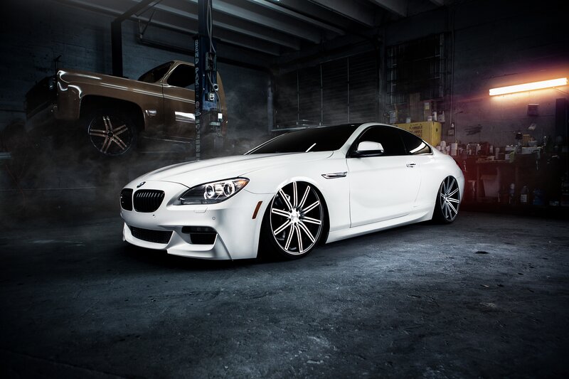 White BMW Coupe — Dramatic, Night, Photograph, Car Lift