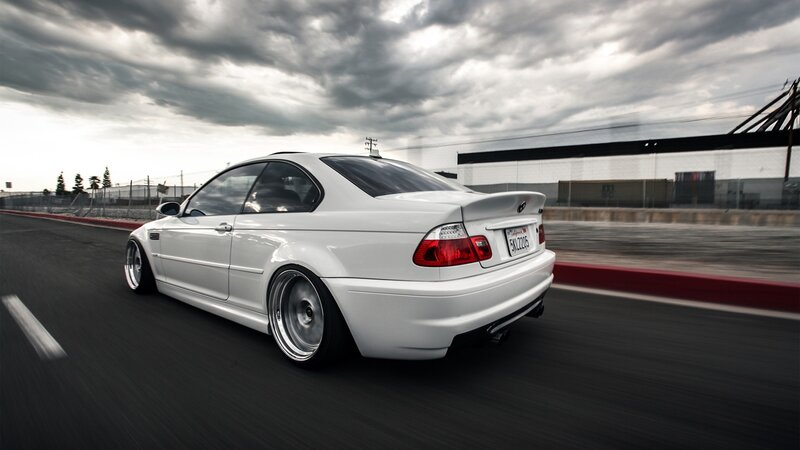 White BMW Coupe — Dramatic, Photograph, Race Track